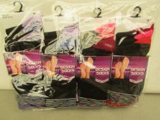 12x Pairs of design socks, size 4-7, new and packaged.