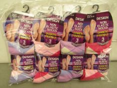 12x Pairs of non elastic socks, size 4-7, new and packaged.