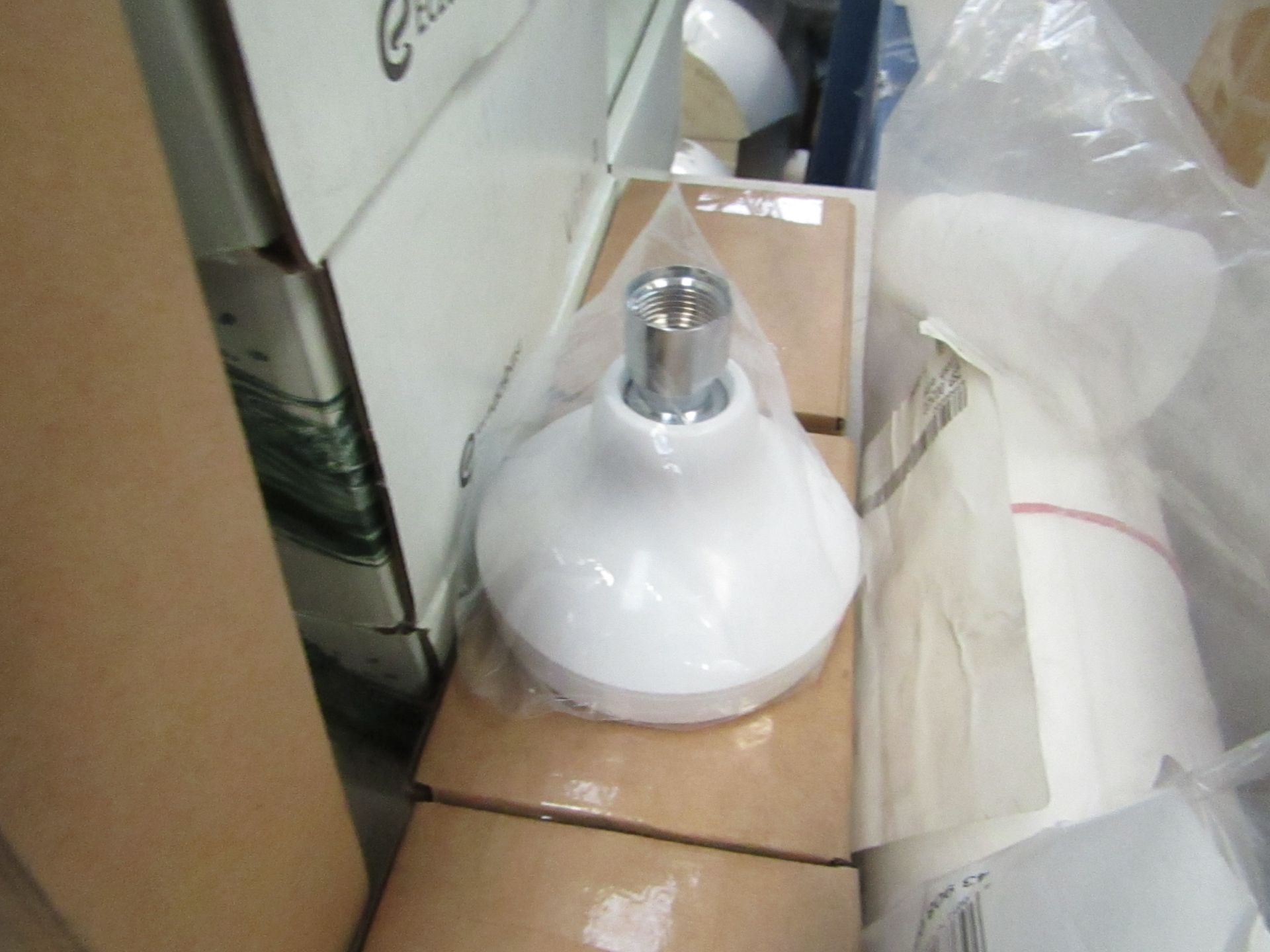 White plastic shower head shell, new and boxed.
