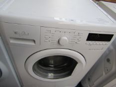 Whirlpool 6th Sense 8Kg washing machine, powers on and spins.