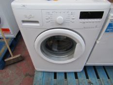 Whirlpool 6th Sense 8Kg washing machine, powers on and spins.