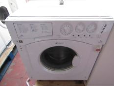 Hotpoint intergrated 7Kg washing machine, powers on and spins but has a loose drum.