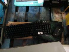 Gaming keyboard and mouse set, tested working and boxed. Has a small bit of cosmetic damage behind