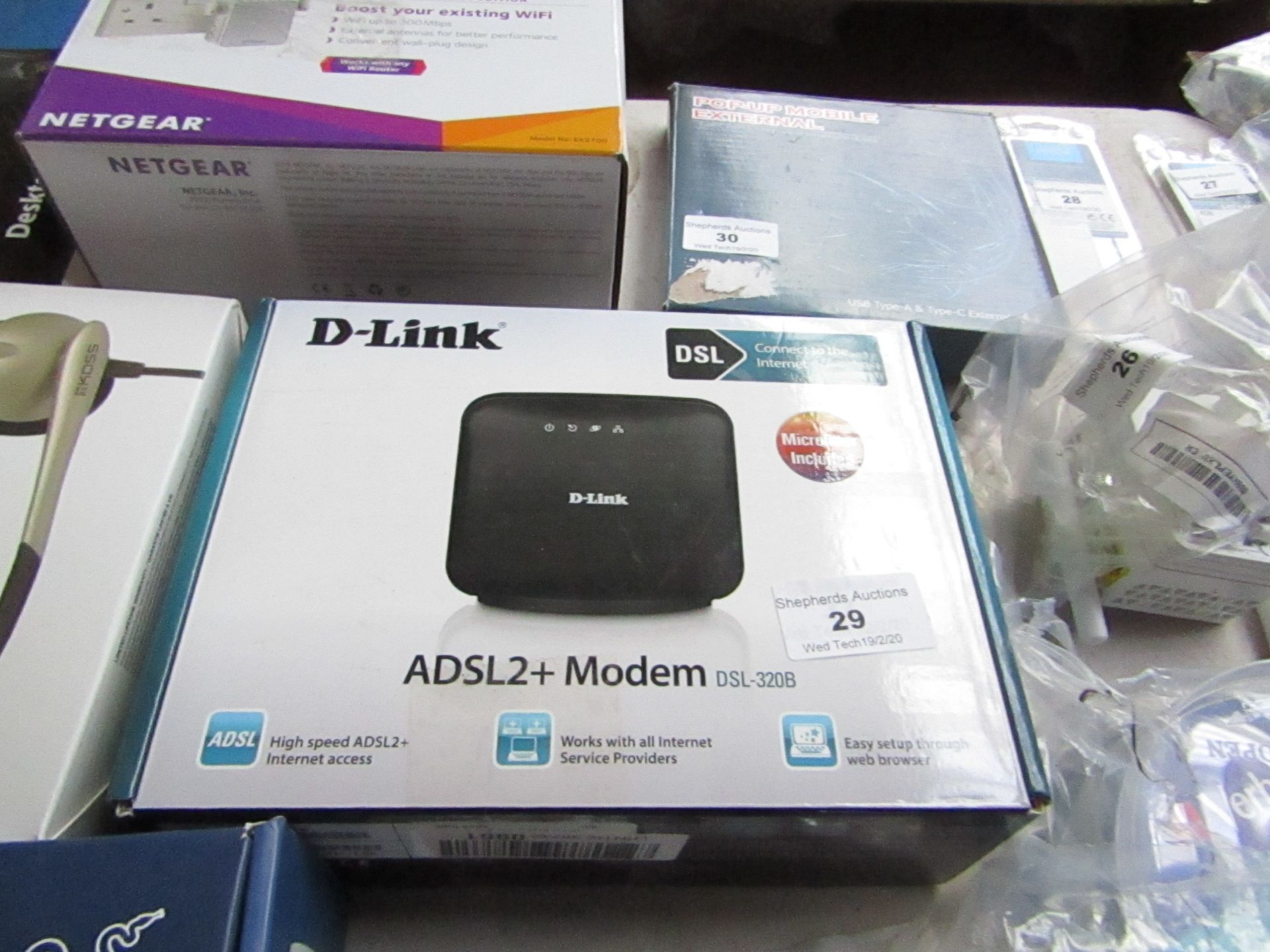 D-Link ADSL2+ modem, untested and boxed.