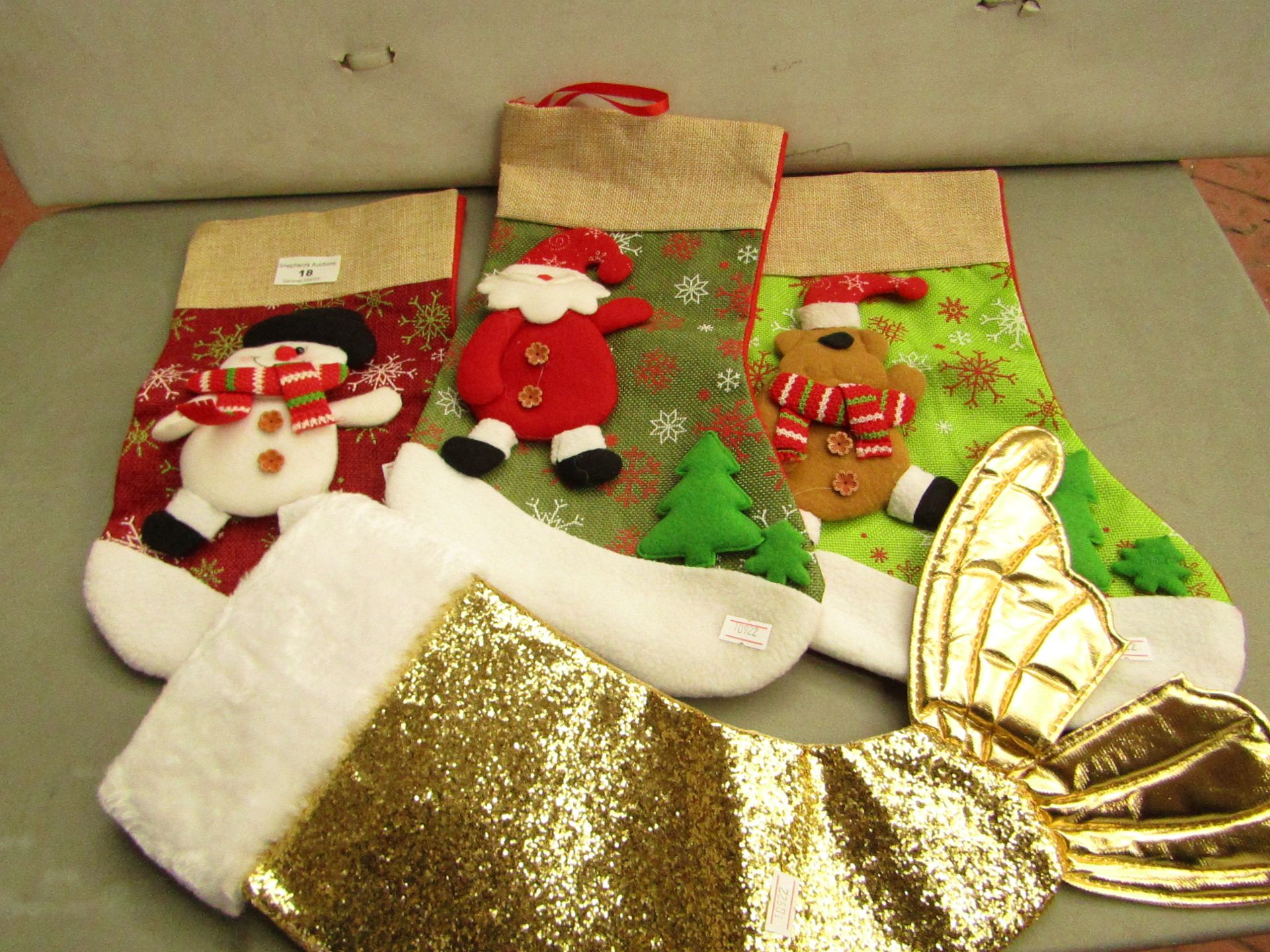 4 x various Xmas Stockings new (see image for design)