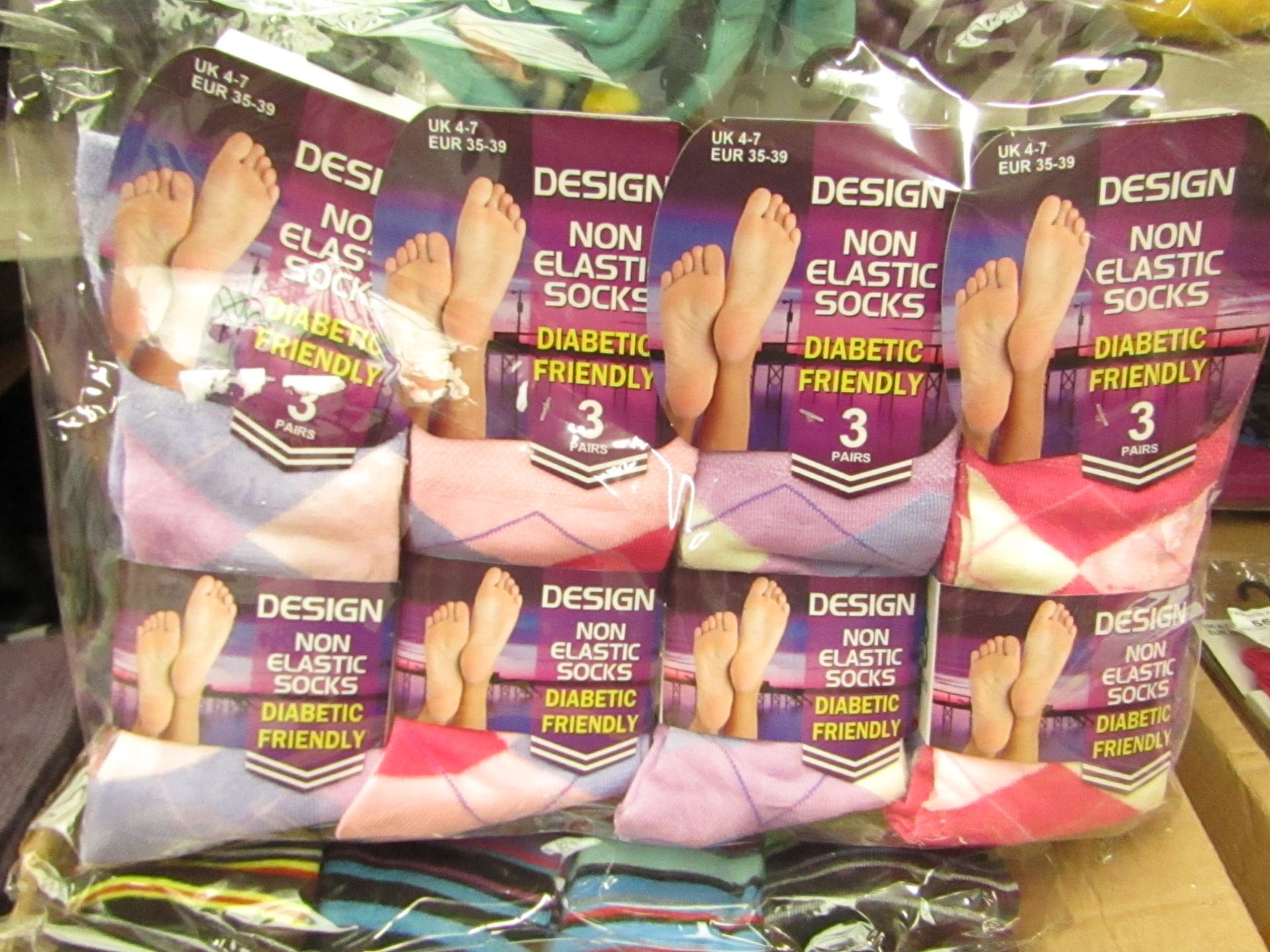 Pack of 12 Ladies Design Socks.Size 4 - 7.New & Packaged