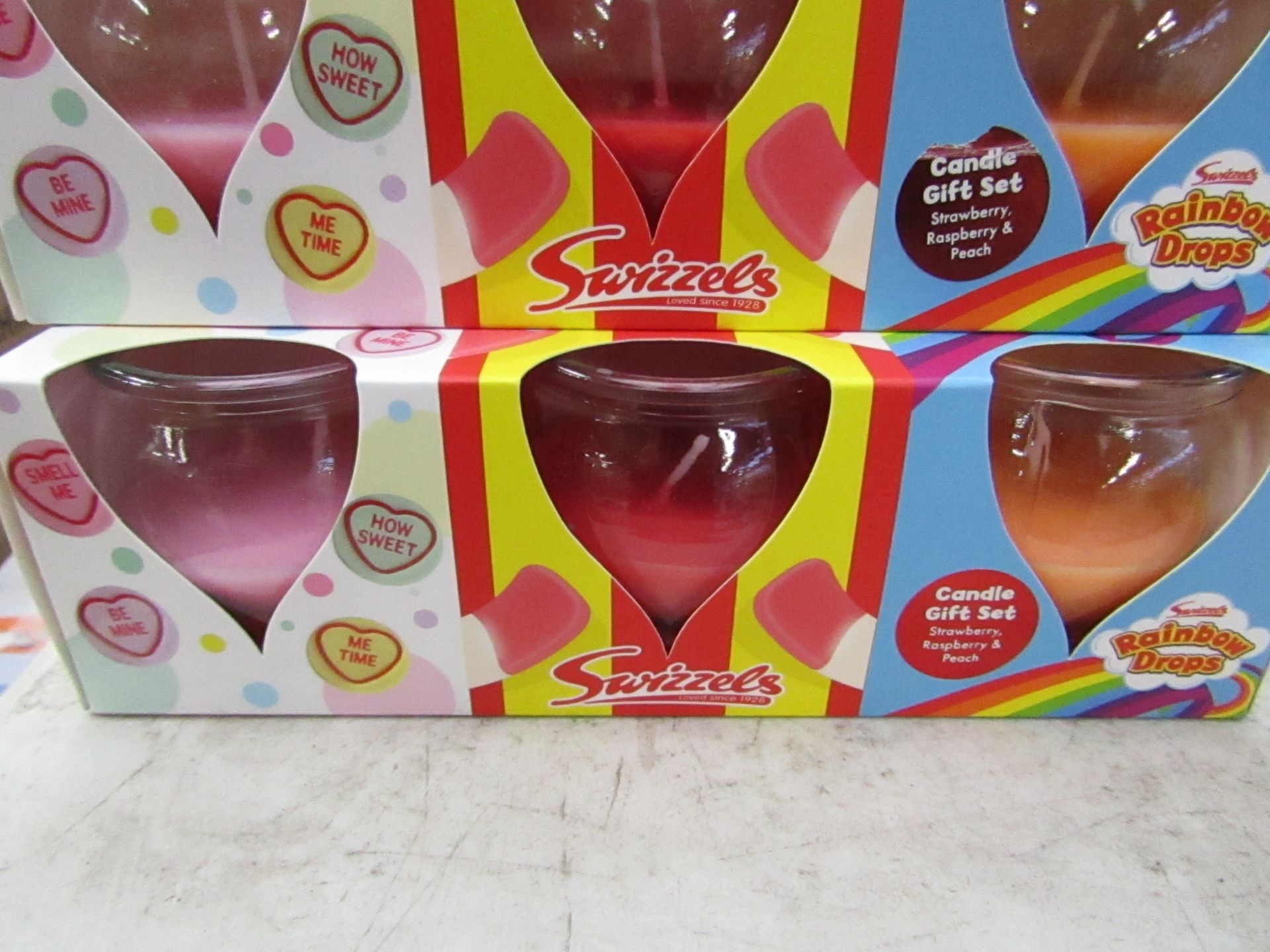 Pack of 3x various scented candles, new and boxed.