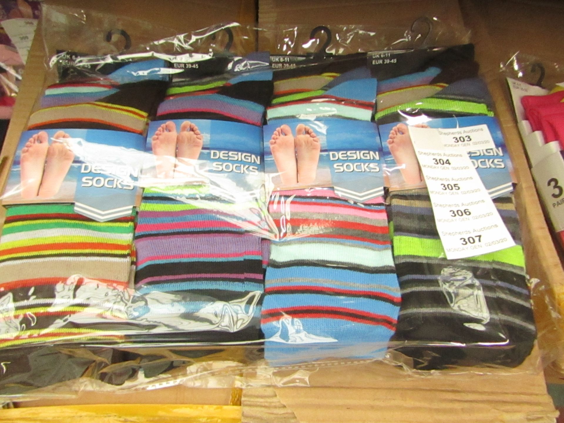 12 Pairs of Mens Design Socks. Size 6 - 11. New & Packaged