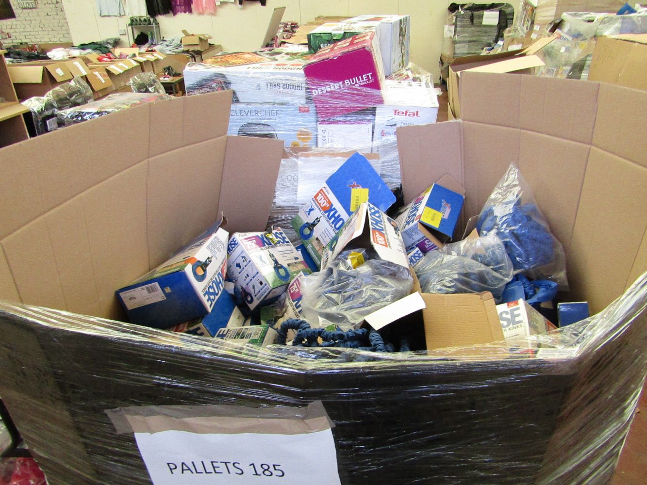 Pallets of raw return Electrical's, Air beds, Xmas Crackers, Protective cases, Exercise Books and More