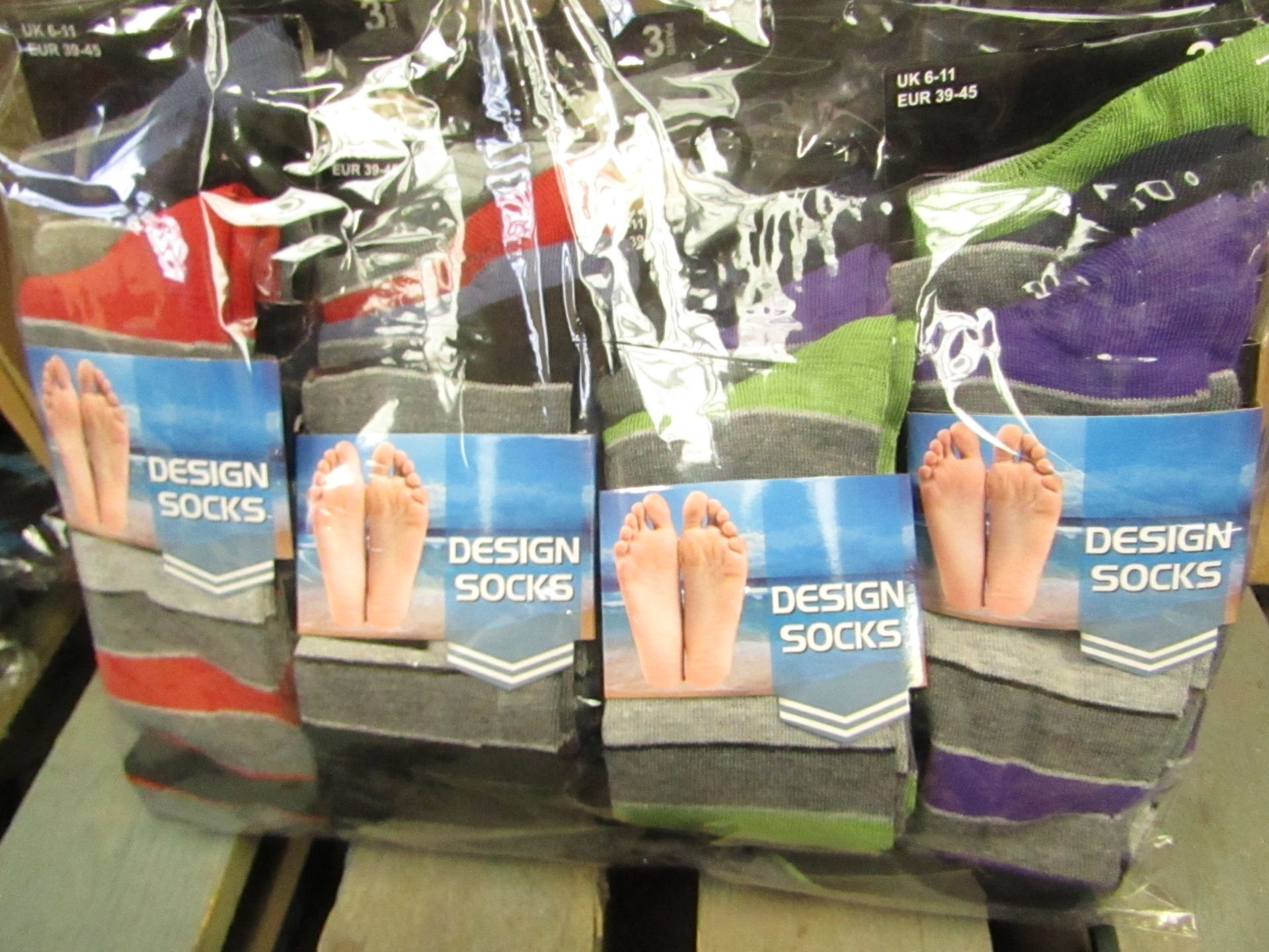 12 X Pairs of Mens Design Socks size 6-11 new in packaging (see image for design)