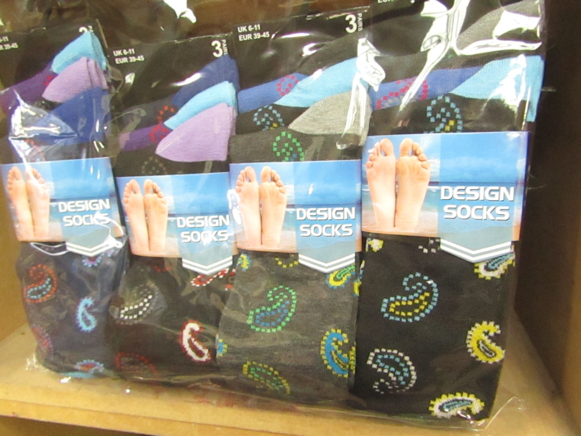 12 X Pairs of Mens Design Socks size 6-11 new in packaging (see image for design)