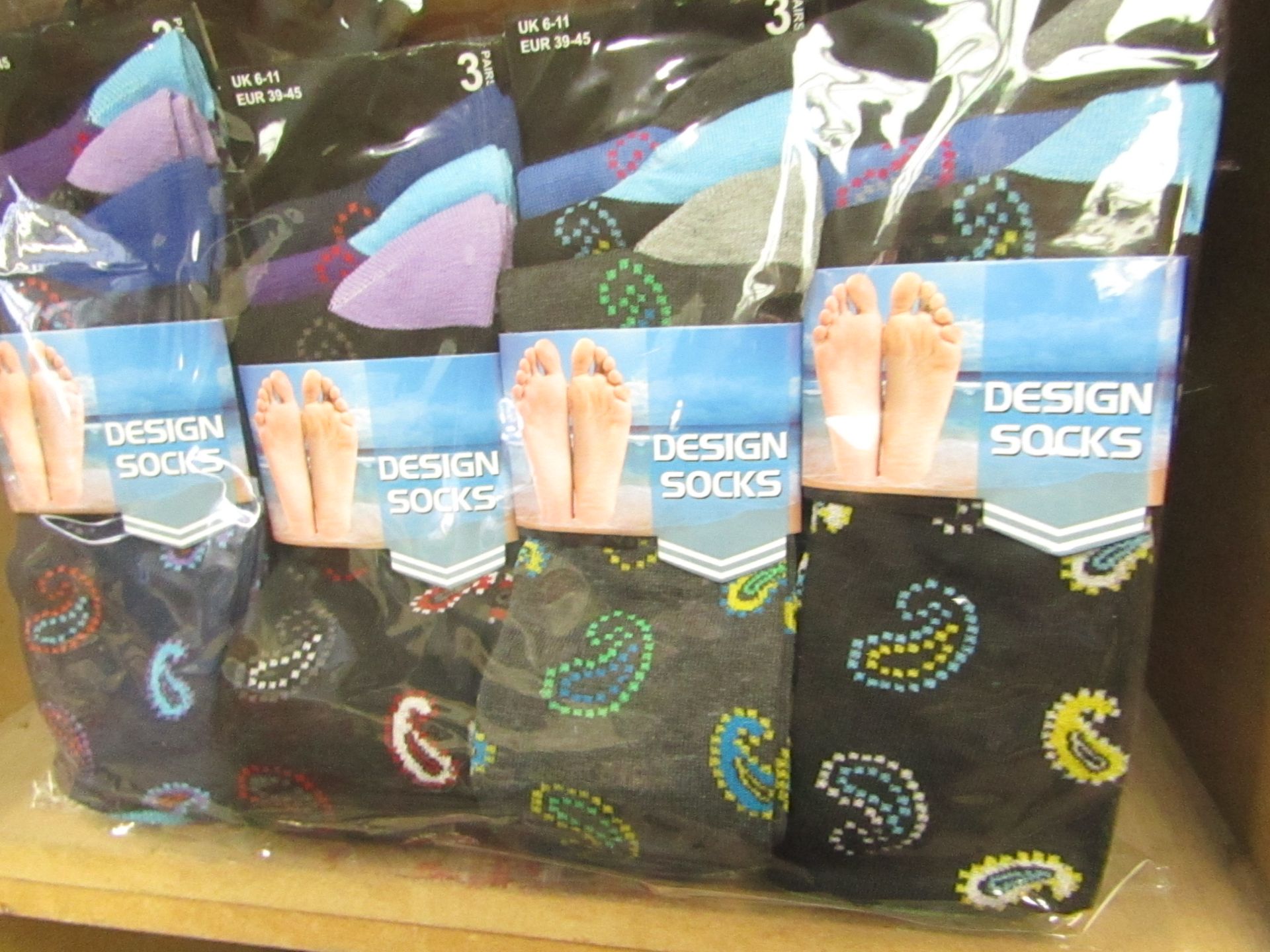 12 X Pairs of Mens Design Socks size 6-11 new in packaging (see image for design)