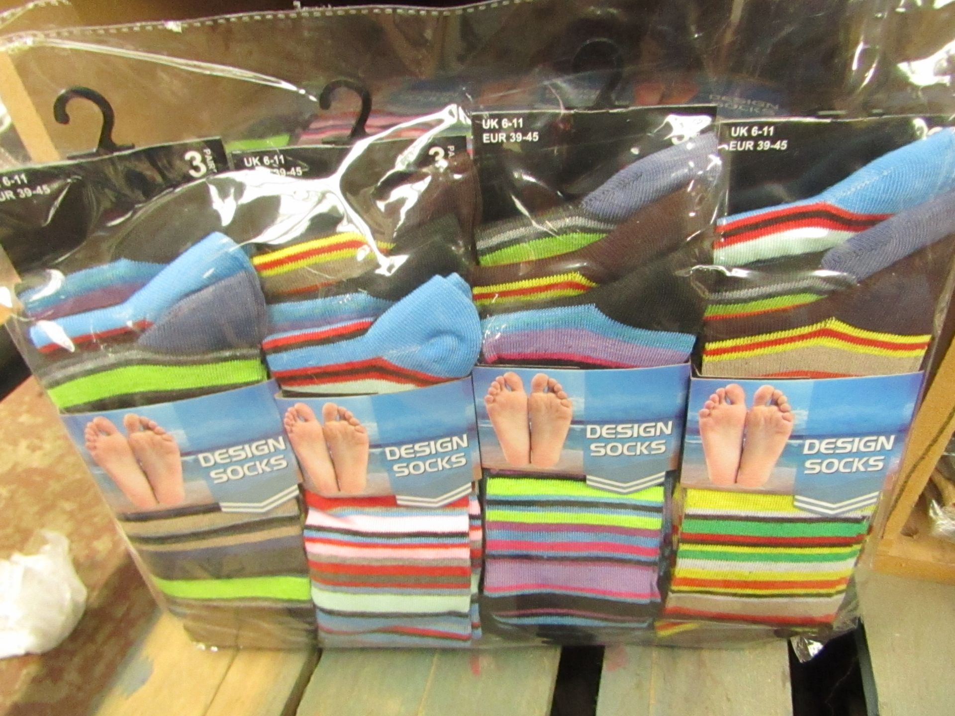 12 X Pairs of Mens Design Socks size 6-11 new in packaging (see image for design)