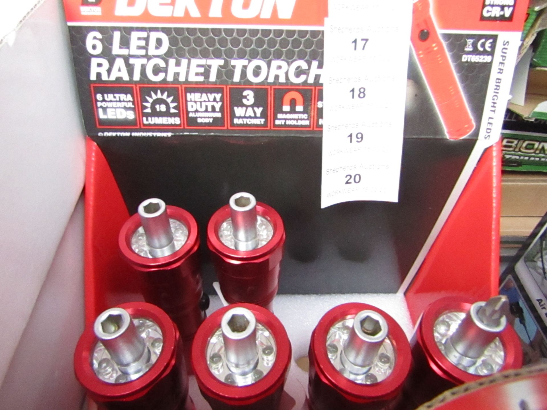 1x Dekton 6 LED ratchet torch with 6 Screw driver Bits in the base, new