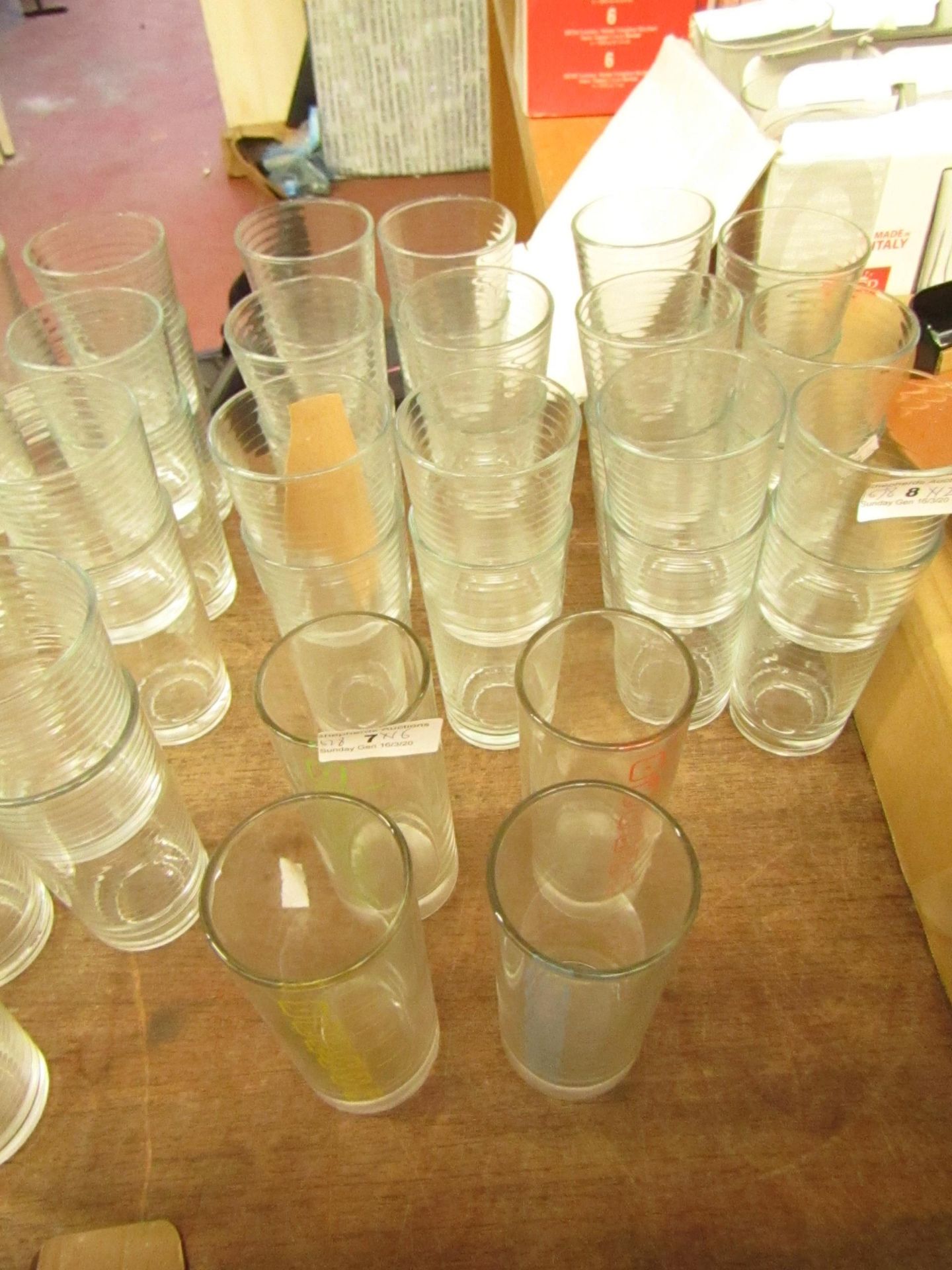 Set with 16 Drinking Glasses. Unused