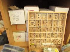 Over 250 packs of 10  per pack Wooden Letters & Numbers with Display Case & Contents