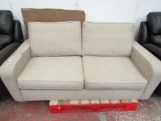 Beige fabric 2 seater sofa bed, in good condition but has a few dirty parts from storage, should