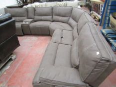 Kuka Sectional Corner sofa with 3 reclining sections and a storage arm rest with cup holders, the