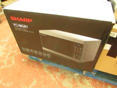Sharp microwave oven with grill / enamel cavity, tested working and boxed.