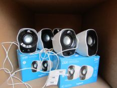 Logitech 2w compact stereo speakers, tested working and boxed.