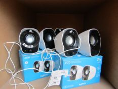 Logitech 2w compact stereo speakers, tested working and boxed.