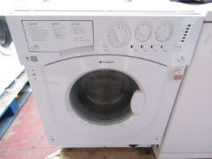 Hotpoint intergrated 7Kg washing machine, powers on and spins but has a loose drum.