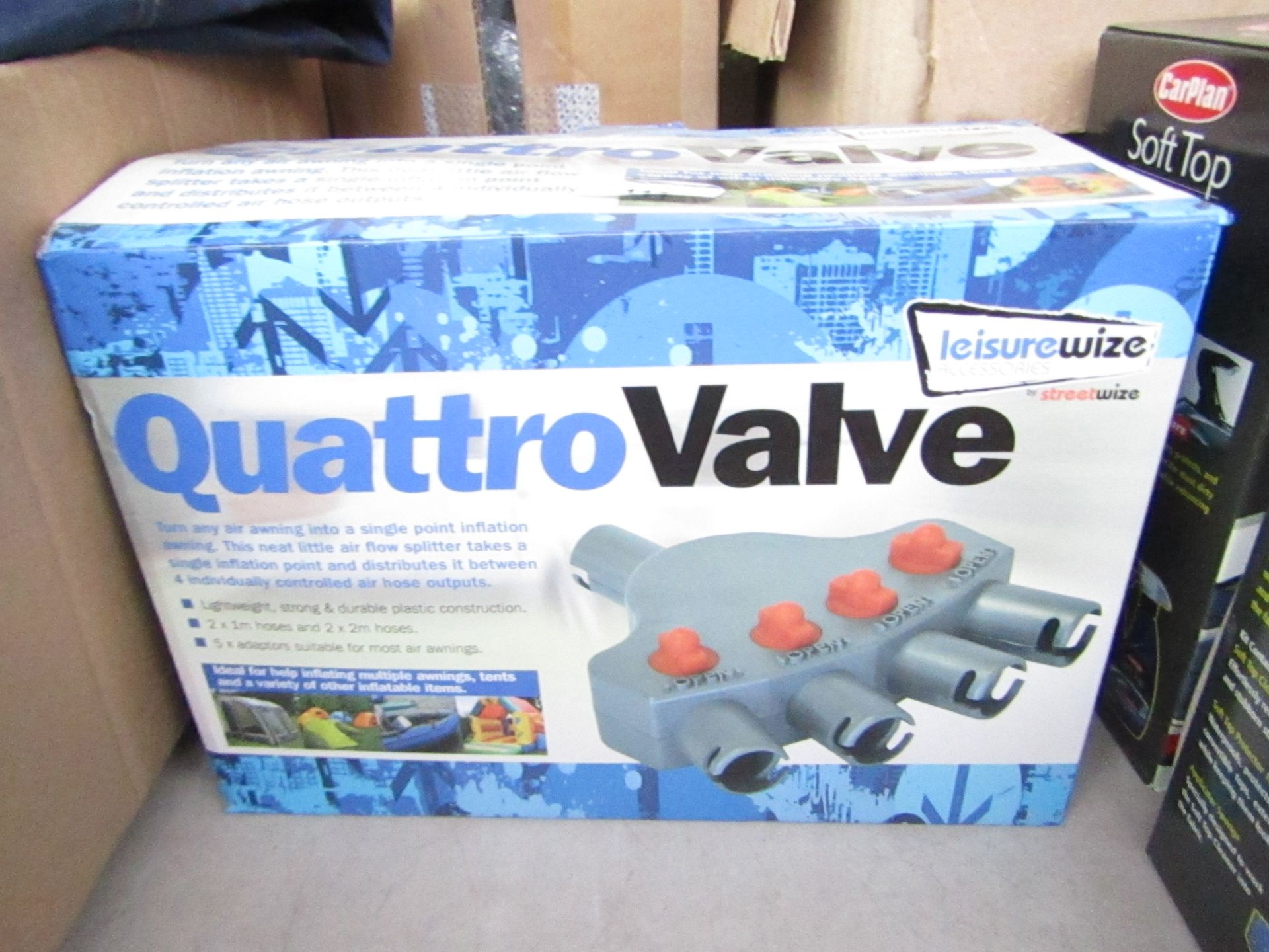 Leisure wise Quattro Valve turns any air awning into a single inflation point, boxed