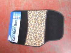 Set of 4 leopard print car mats, new and packaged.