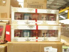 Pack of 5x festive candles, new and boxed.