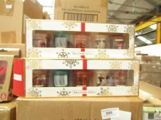 Pack of 5x festive candles, new and boxed.