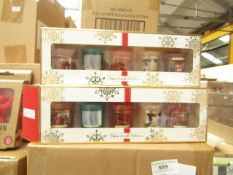 Pack of 5x festive candles, new and boxed.