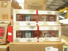 Pack of 5x festive candles, new and boxed.