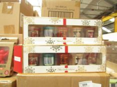 Pack of 5x festive candles, new and boxed.