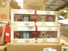 Pack of 5x festive candles, new and boxed.