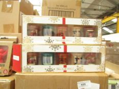 Pack of 5x festive candles, new and boxed.