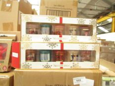 Pack of 5x festive candles, new and boxed.