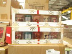 Pack of 5x festive candles, new and boxed.