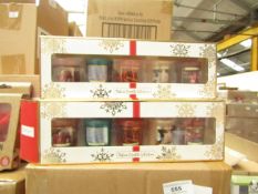 Pack of 5x festive candles, new and boxed.