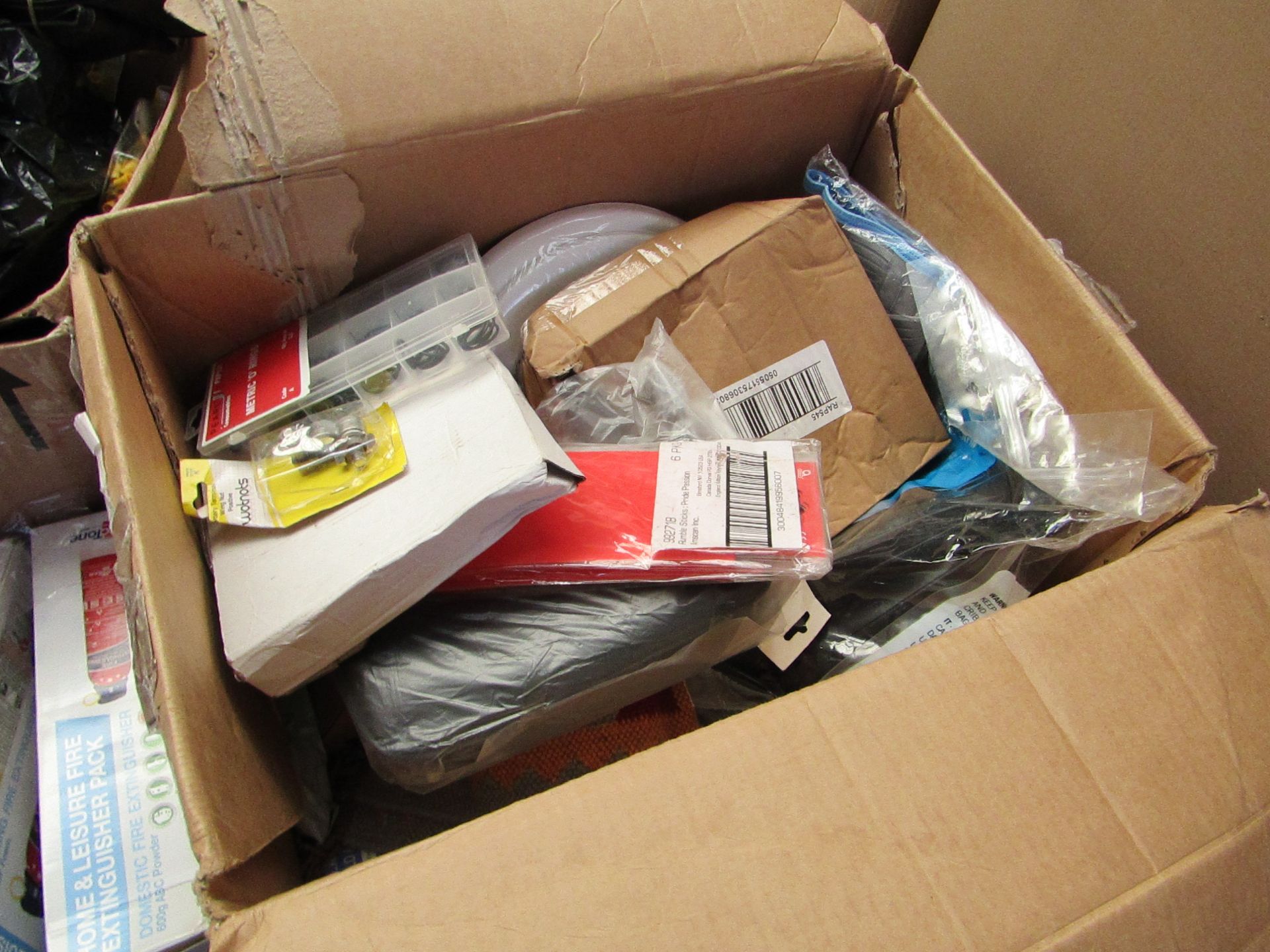 Box containing over 10x items such as a rug, fixing kits and more. Unchecked.