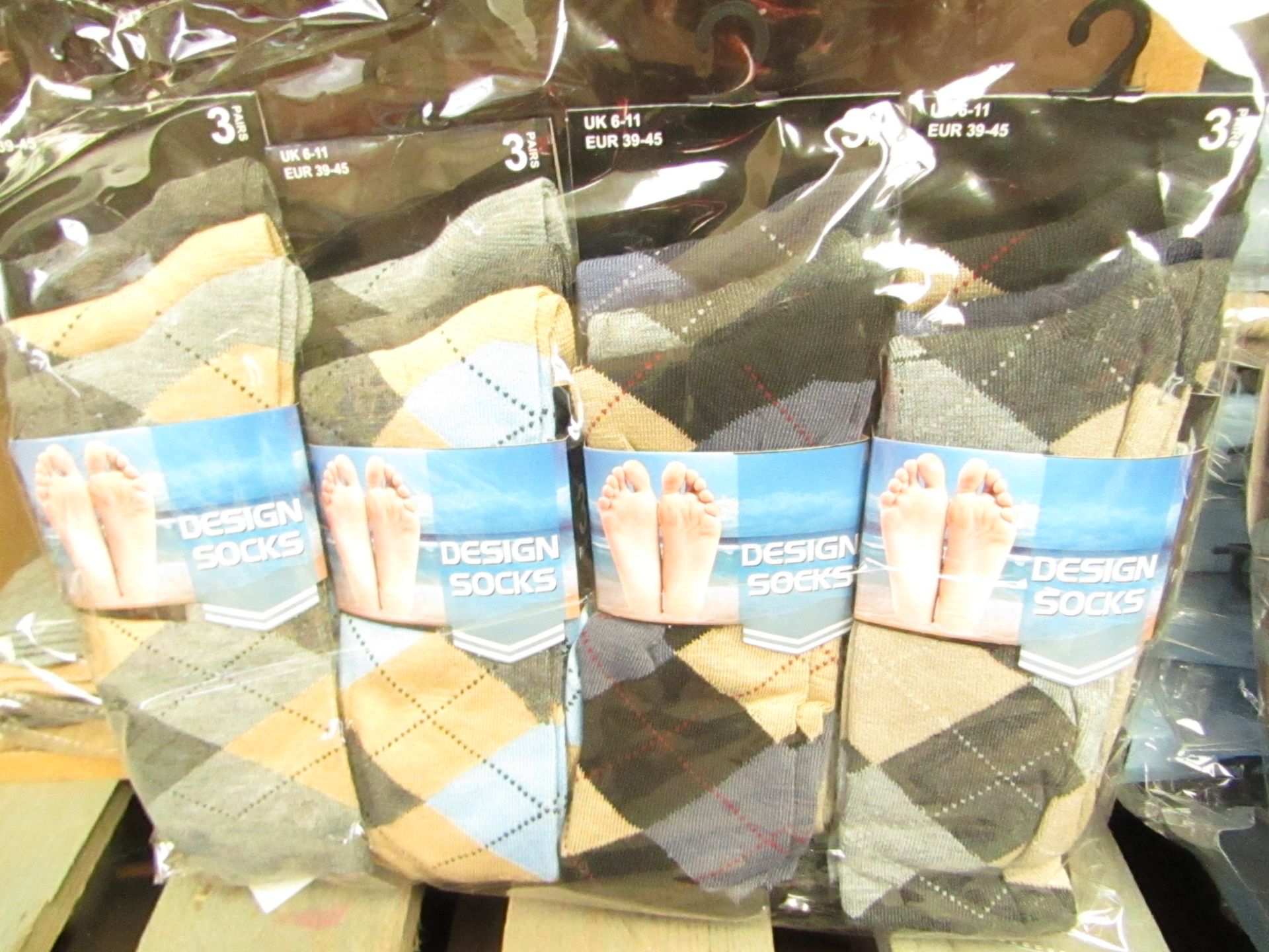 12 X Pairs of Mens Design Socks size 6-11 new in packaging (see image for design)