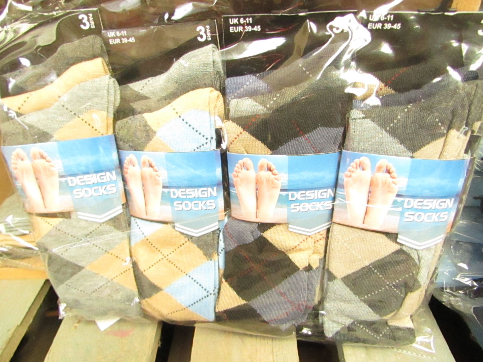 12 X Pairs of Mens Design Socks size 6-11 new in packaging (see image for design)