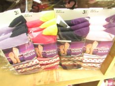 12 X Pairs of Ladies Design Socks size 4-7 new in packaging (see image for design)