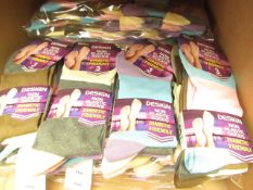 12 x Pairs of Ladies Design Non Elastic Socks size 4-7 new in packaging (see image for design)