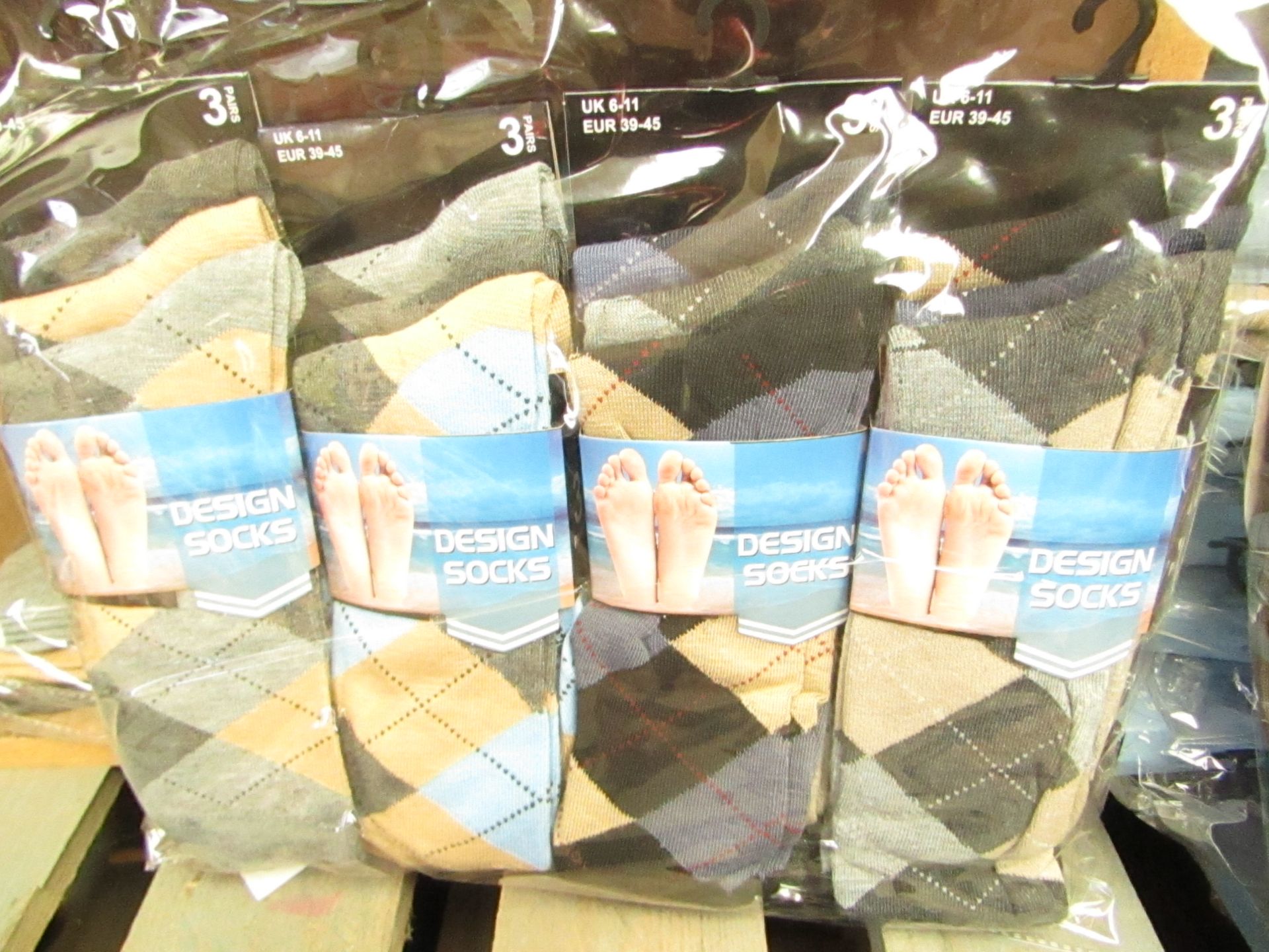 12 X Pairs of Mens Design Socks size 6-11 new in packaging (see image for design)