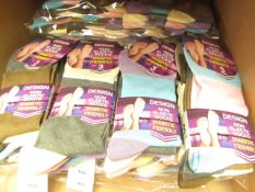 12 x Pairs of Ladies Design Non Elastic Socks size 4-7 new in packaging (see image for design)