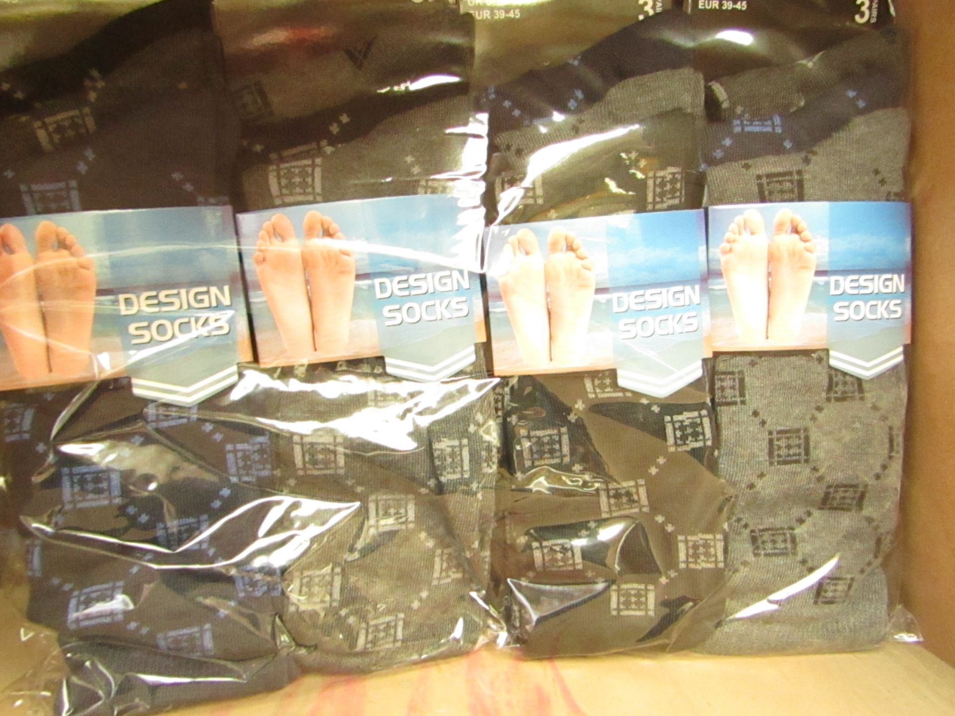 12 X Pairs of Mens Design Socks size 6-11 new in packaging (see image for design)