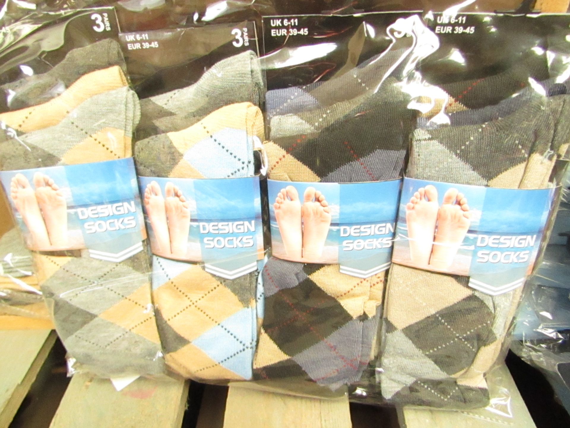 12 X Pairs of Mens Design Socks size 6-11 new in packaging (see image for design)