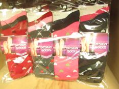 12 X Pairs of Ladies Design Socks size 4-7 new in packaging (see image for design)