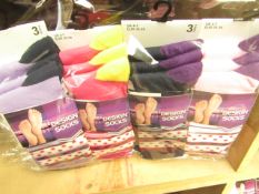 12 X Pairs of Ladies Design Socks size 4-7 new in packaging (see image for design)