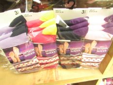 12 X Pairs of Ladies Design Socks size 4-7 new in packaging (see image for design)